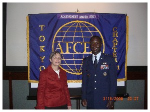 Capt. Sandra Buckles, USN, thanks Lt. Gen. Edward A. Rice Jr., USAF, U.S. Forces Japan and 5th Air Force, for his presentation at the March dinner meeting.